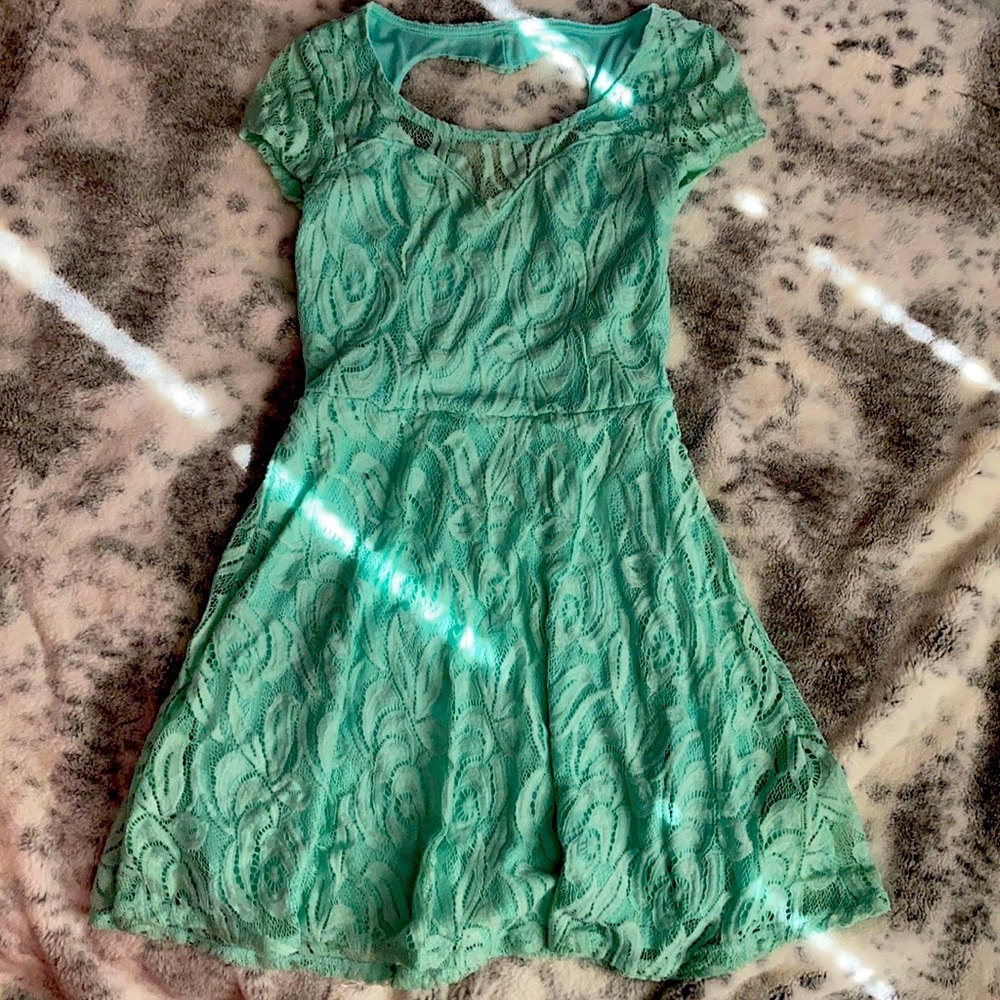 NoBo small teal dress with a heart shape back